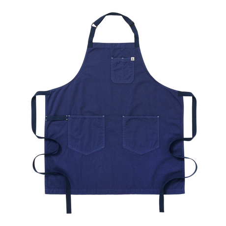 Blue apron with multiple pockets on a white background