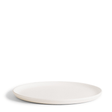 White ceramic plate on a white background