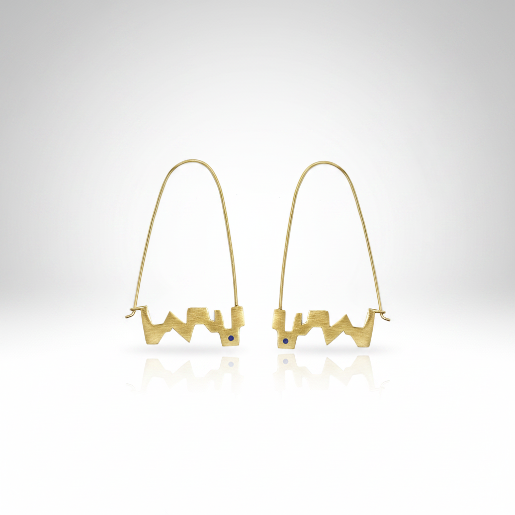 Gold earrings with a white background