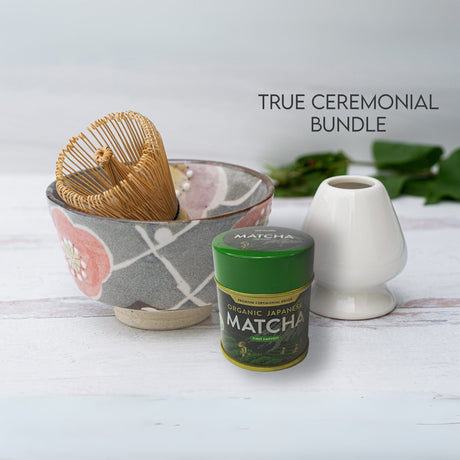 The "True Ceremonial Bundle" includes a Gray with Flowers Ceramic Matcha Bowl, Bamboo Matcha Whisk, Whisk Holder, and Organic Japanese Matcha Set for an authentic tea experience.
