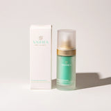 Vaihea skincare serum bottle and packaging on a light background