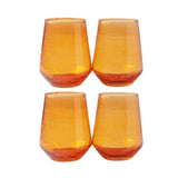 Four amber stemless wine glasses on a white background