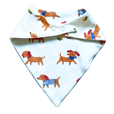 Baby bib with dachshund pattern on a white background