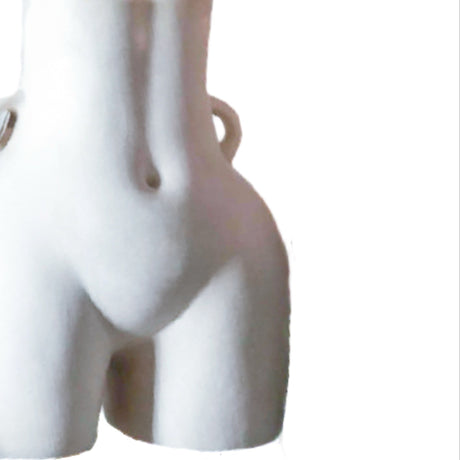 Vase shaped like a woman's body on a white background