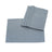 Set of blue textured fabric placemats on a white background