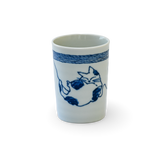 The Adorable Cat 5 Tea Cup is a blue and white Mino-ware piece, holding 180ml (6oz.), with a serene sleeping cat and blue stripes on a black background, crafted in Gifu Prefecture.