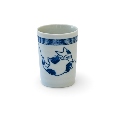 The Adorable Cat 5 Tea Cup is a blue and white Mino-ware piece, holding 180ml (6oz.), with a serene sleeping cat and blue stripes on a black background, crafted in Gifu Prefecture.