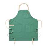 Green apron with beige straps on a white background