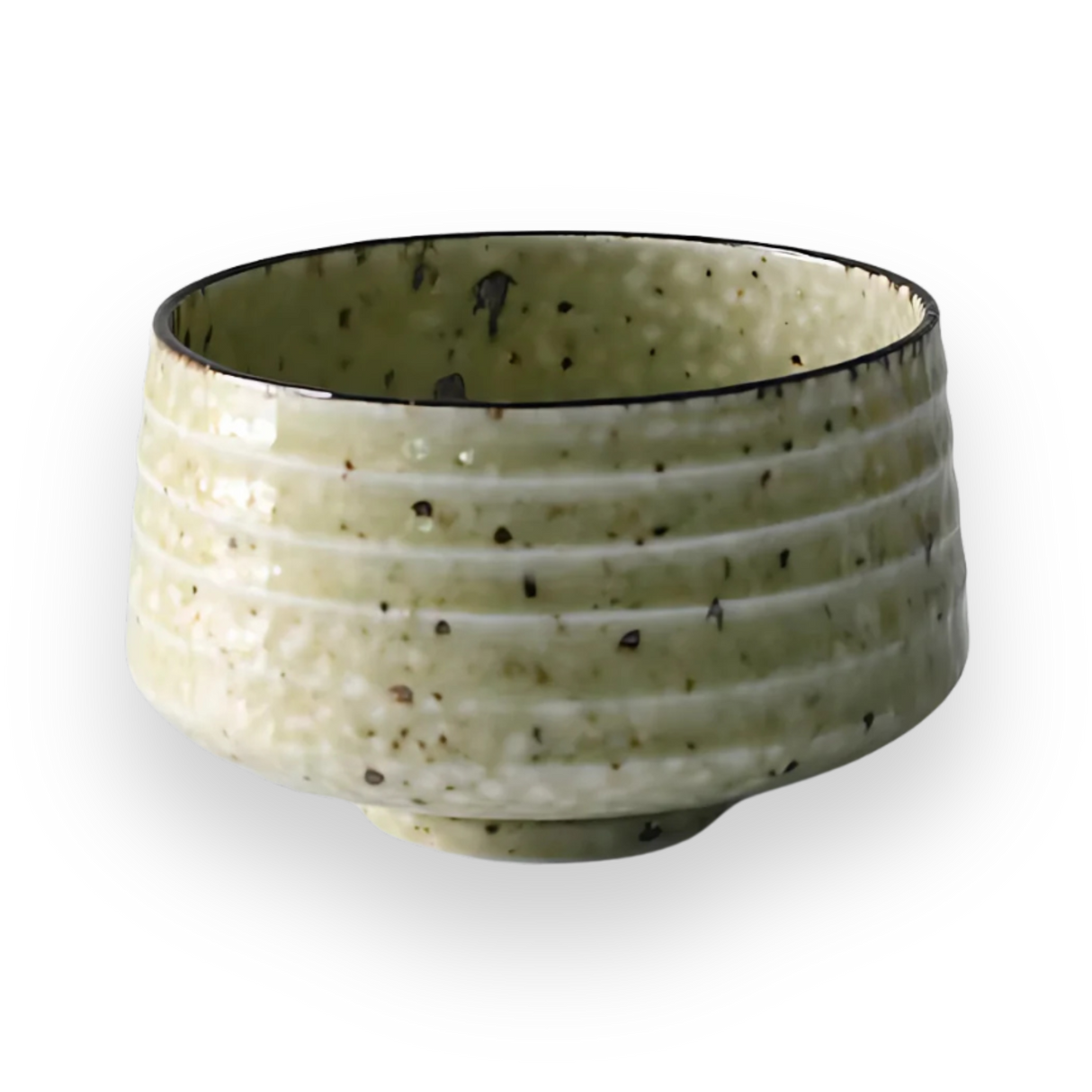The Kaneni White Ceramic Matcha Bowl showcases a speckled design with horizontal grooves, embodying the essence of Japanese pottery against a bold black background.