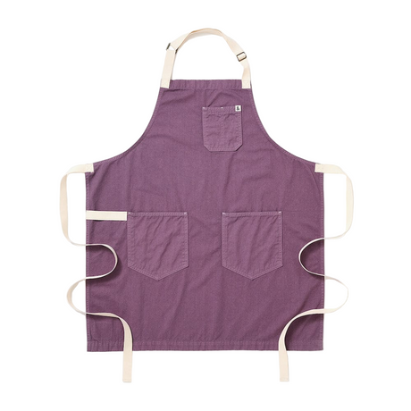 Purple apron with three pockets on a white background