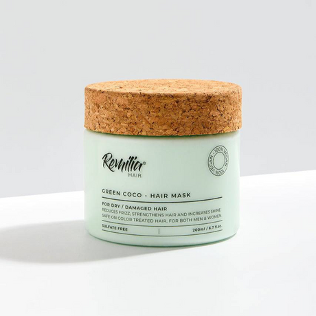 Remilia Green Coco hair mask jar with cork lid on a white background