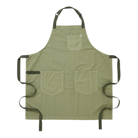 Green apron with three pockets on a white background