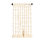Decorative wall hanging with a textured pattern on a white background