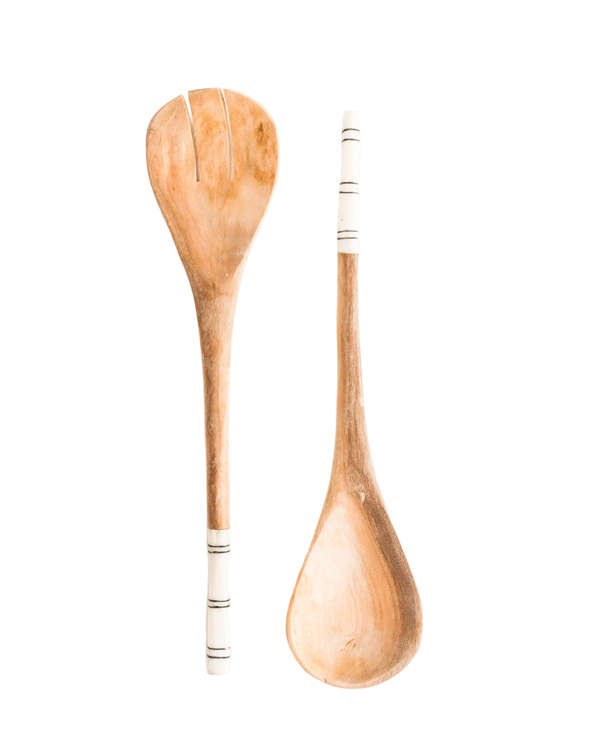 Two wooden spoons with white handles on a white background