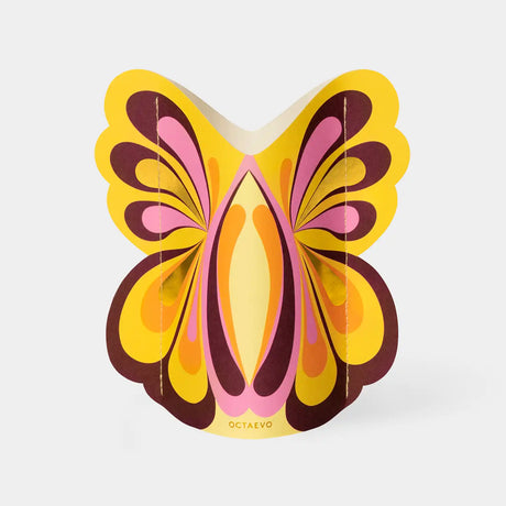 Butterfly-shaped card with colorful design on a white background