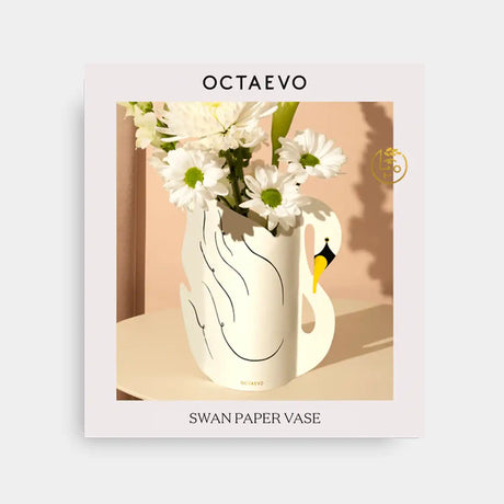 Swan-shaped paper vase with flowers on a light background, featuring the brand 'OCTAEVO'.