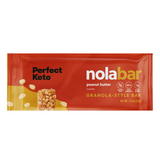 Red package of Perfect Keto nola bar peanut butter flavor on a white background