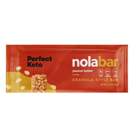 Red package of Perfect Keto nola bar peanut butter flavor on a white background