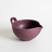 Purple ceramic bowl with a handle on a white background