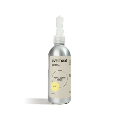 Silver spray bottle labeled 'everneat' on a white background