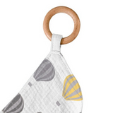 Baby teething ring with wooden ring and fabric strap featuring hot air balloon design on a white background