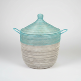 Woven storage basket with a blue top and beige bottom on a white background