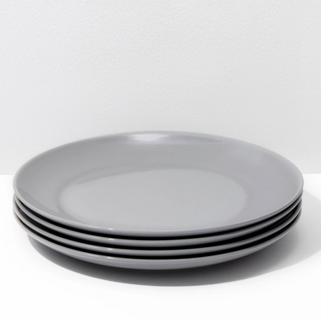 Stack of gray plates on a white background