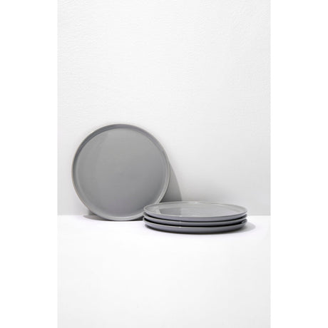 Set of gray ceramic plates on a white background
