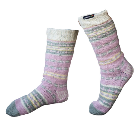 Multicolored striped socks being worn on a white background