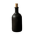 Black bottle with cork next to a lemon on a white background
