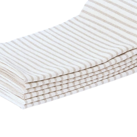 Stack of folded gray and white striped cloth napkins on a white background