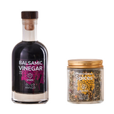 Bottle of Balsamic Vinegar and jar of Spices from Olivo Amigo on a white background