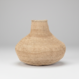 Woven basket on a gray background
