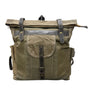 Green backpack with leather straps on a white background