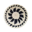 Round woven basket with black and beige pattern on a white background