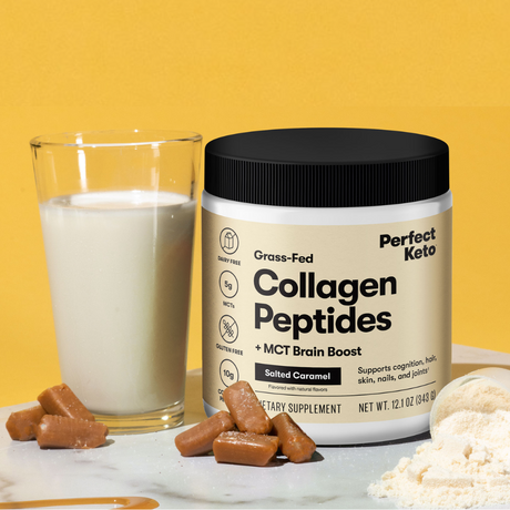 Jar of Perfect Keto Collagen Peptides with a glass of milk and caramel candies on a yellow background