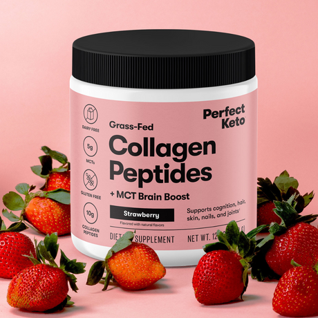 Perfect Keto collagen peptides container with strawberries on a pink background