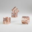 Set of copper napkin holders on a white background