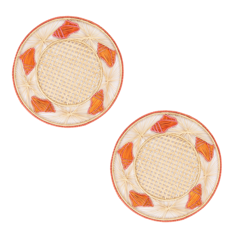 Two woven placemats with orange geometric patterns on a white background