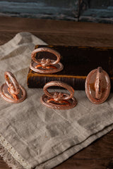 S/4 Vintage Inspired Copper Napkin Rings with Embossed Cross & Bow Pattern