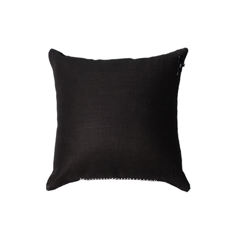 Black pillow on a light gray background