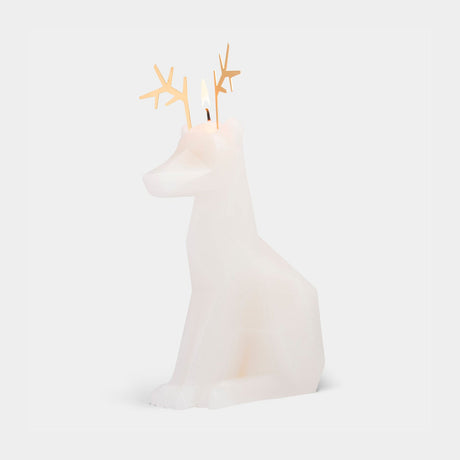 White candle shaped like a reindeer with gold antlers on a white background