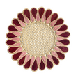 Decorative woven placemat with red and pink petal-like design on a white background