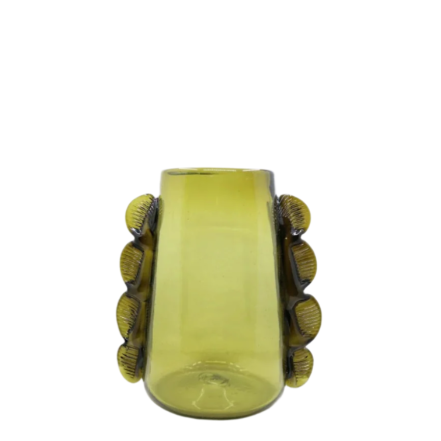 Green glass vase with decorative elements on a white background