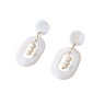 Pair of earrings with white circular pendants and pearl-like beads on a white background