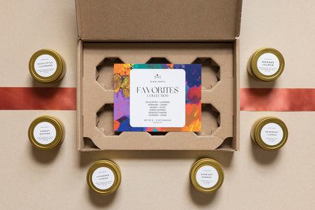 Gift set with small jars and a colorful card on a beige background. 2oz Mini Tins 6 Count