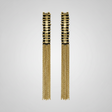 Pair of gold tassel earrings on a light gray background