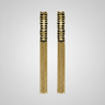 Pair of gold tassel earrings on a light gray background