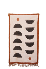 Rug with geometric pattern and fringes on a white background
