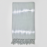 Silver scarf with fringes on a white background